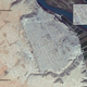 A 2014 satellite image of Dura Europos published by the American Schools of Oriental Research. The detail in the top-right shows looting holes.